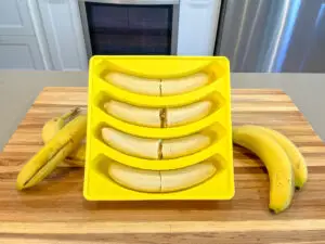 Silicone freezer tray on the counter full of bananas