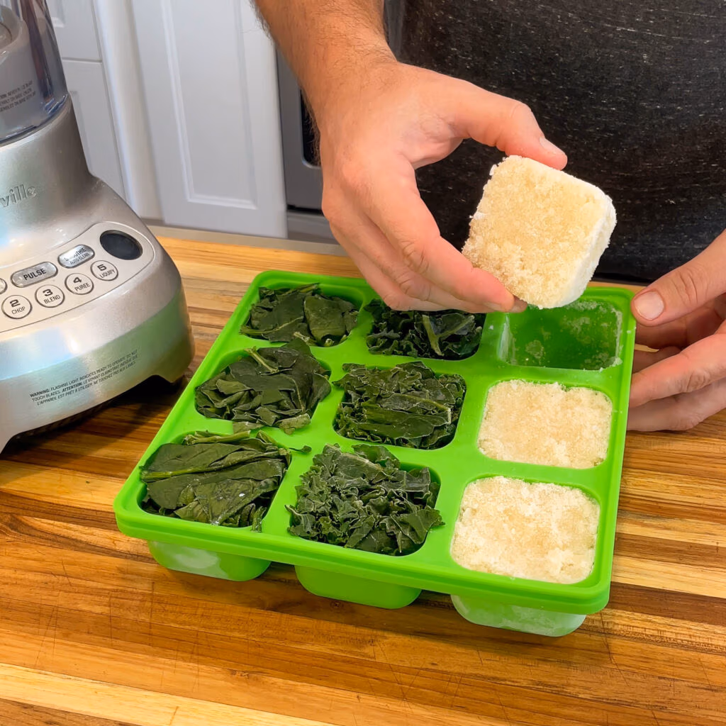Frozen cubes of cauliflower being taken out of a Smootheeze tray