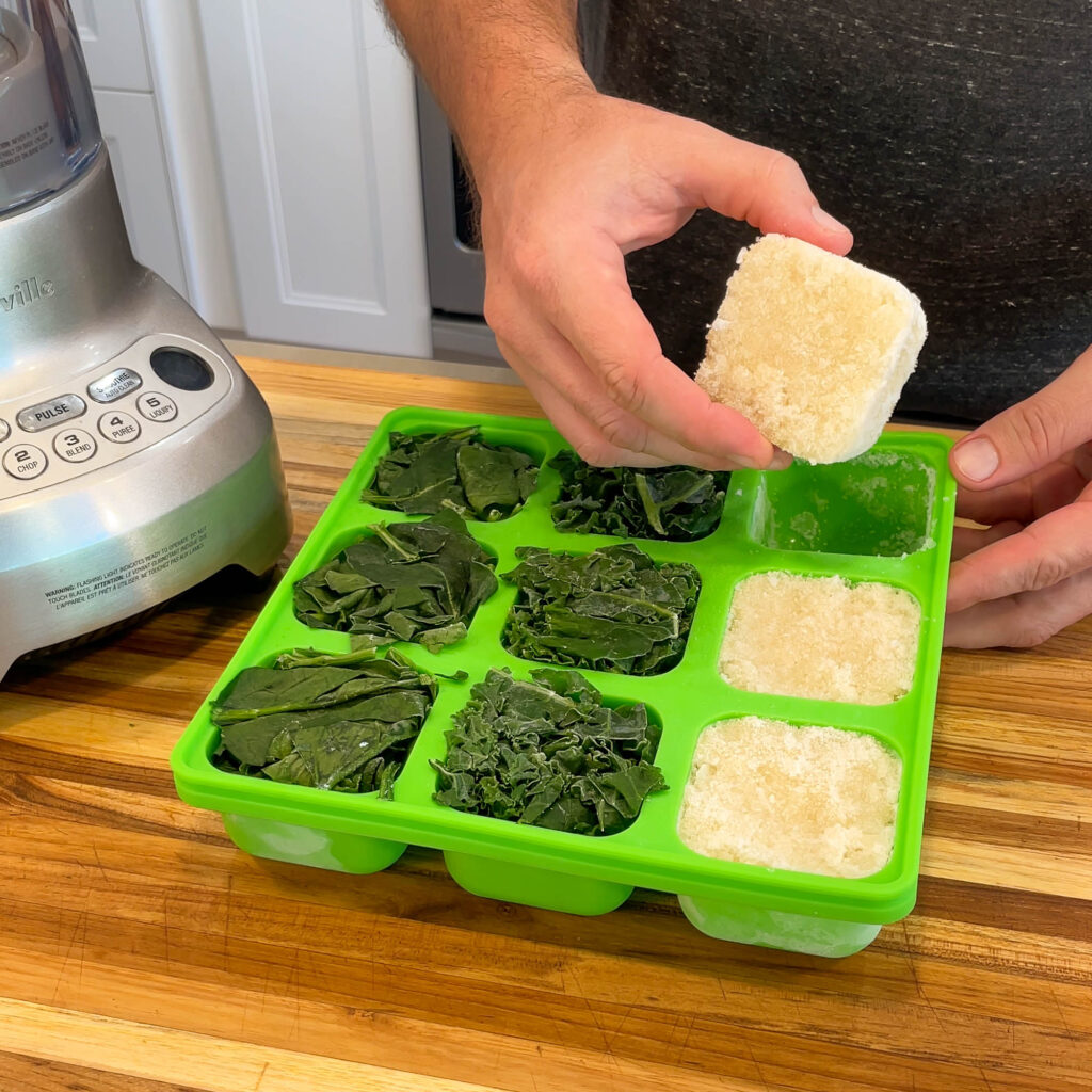Frozen cubes of cauliflower being taken out of a Smootheeze tray